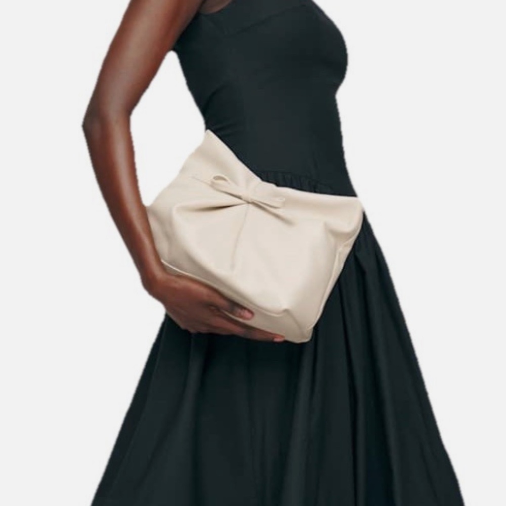 reformation vittoria clutch in almond leather